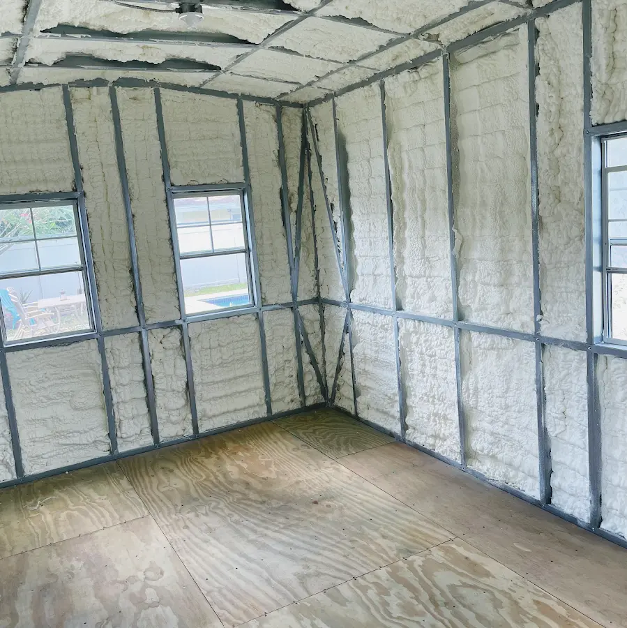 Closed-cell spray foam insulation applied to wall cavities in a residential project in Glenn Dale